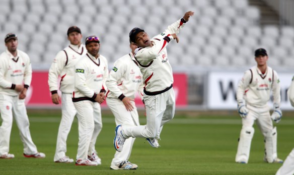 LANCASHIRE COUNTY CRICKET CLUB Emirates Old Trafford LV= County Championship LANCS V GLOUCESTERSHIRE 12/05/15 Day3 Alviro Petersen leaps for the ball