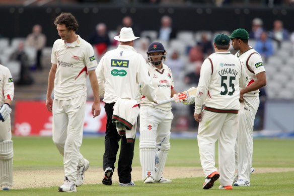 LANCASHIRE COUNTY CRICKET CLUB Emirates Old Trafford Lancashire v Leicestershire LV= County Championship Division Two, 15/06/15 Ashwell Prince with umpires